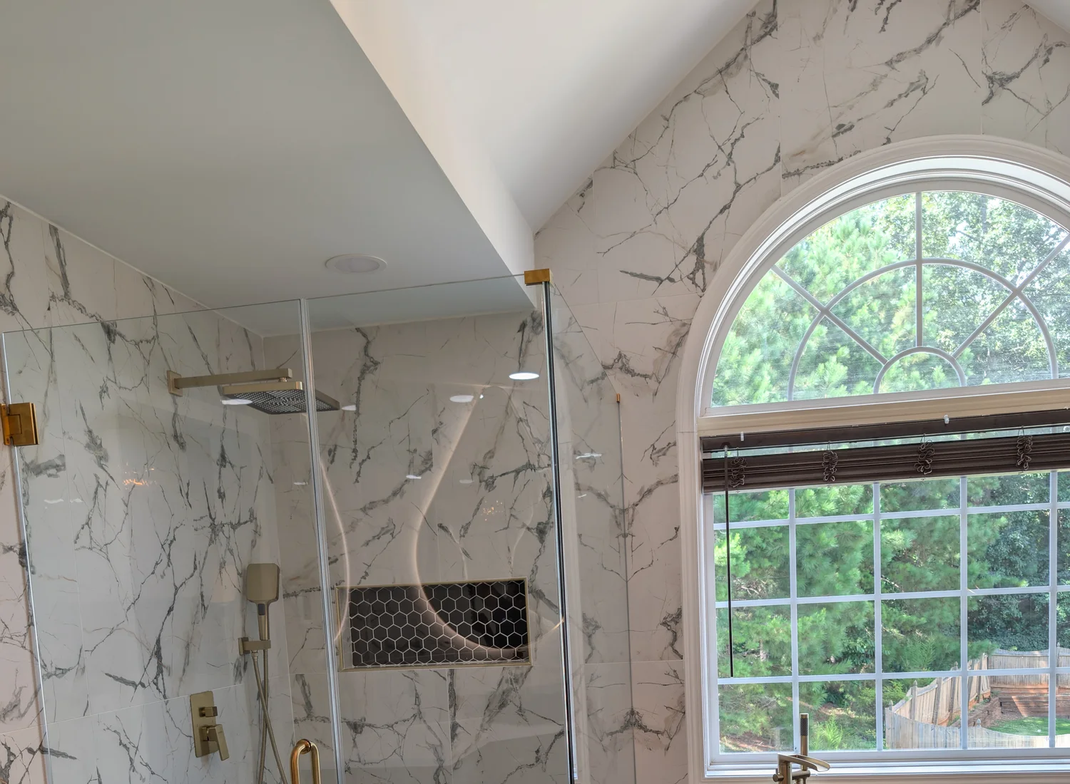 Frameless shower and soaking tub